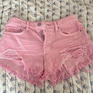 Pink jean shorts from We The Free. Button down.